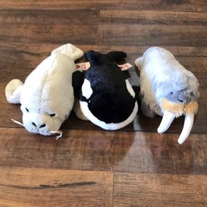 Three webkinz: manatee, orca whale, and walrus